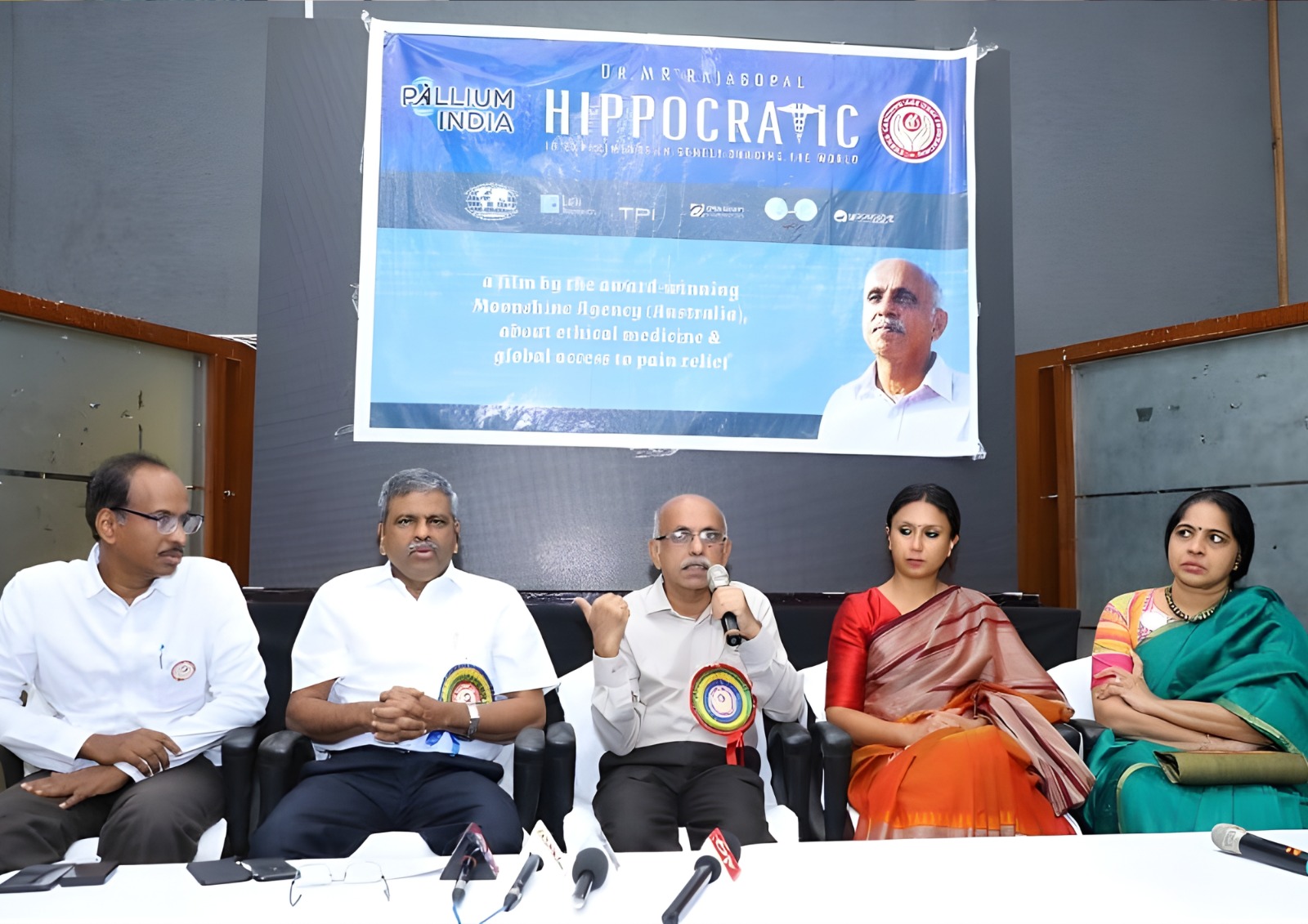 A group of people in a seminar about senior rights.