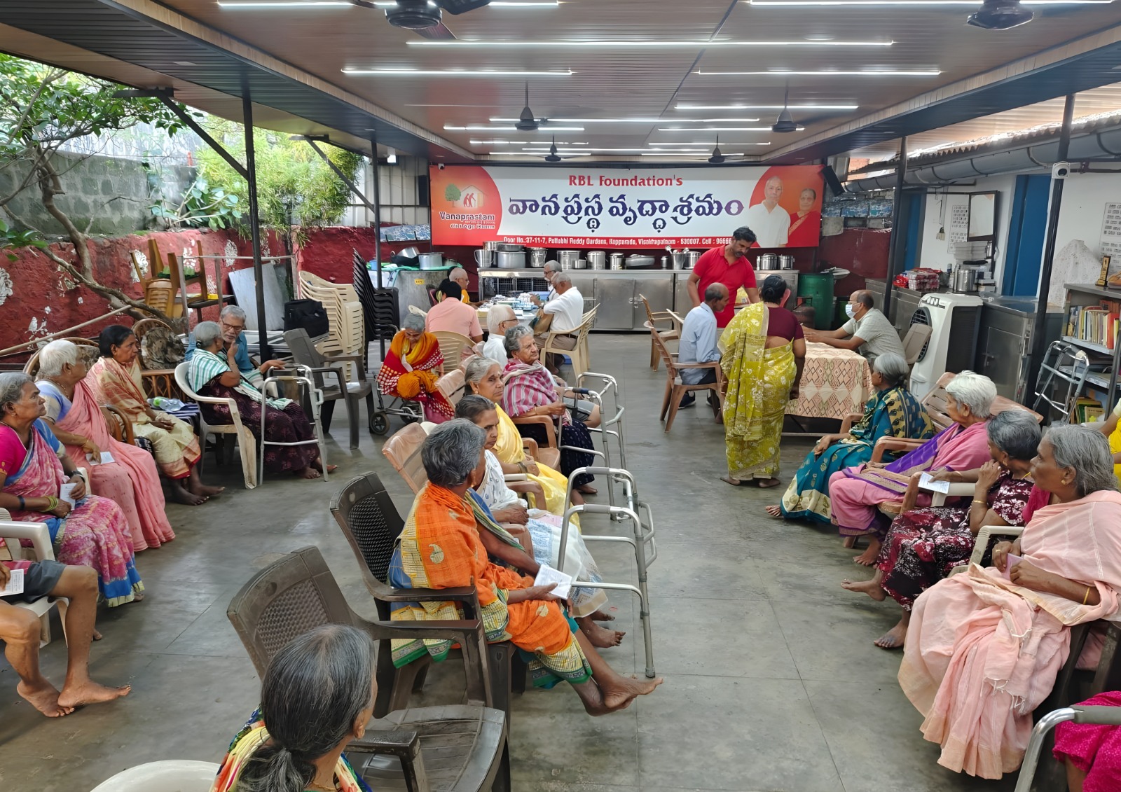 A doctor conducting a health check-up at a community center.